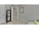 Neutral bedroom featuring a comfortable bean bag chair and mirrored closet at 3826 Dandridge Way, Duluth, GA 30096