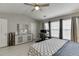 Bedroom with natural light, neutral paint, and a white dresser at 3826 Dandridge Way, Duluth, GA 30096