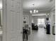 View of open-concept living space with dining area and contemporary decor at 3826 Dandridge Way, Duluth, GA 30096