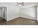 Bedroom featuring ceiling fan, new floors and neutral walls for a modern, clean look at 4322 Idlewood Ln, Tucker, GA 30084