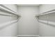 Walk-in closet with installed shelving and new floors at 4322 Idlewood Ln, Tucker, GA 30084
