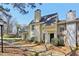 A charming home with a lush lawn and mature trees provides a picturesque and inviting curb appeal at 4322 Idlewood Ln, Tucker, GA 30084