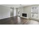 Inviting living room featuring a classic fireplace and natural light for cozy evenings and relaxation at 4322 Idlewood Ln, Tucker, GA 30084