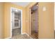 Bathroom showing a glass enclosed shower with tiled walls and built-in storage at 100 Oakwind Pkwy, Canton, GA 30114