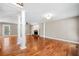 Open living room with hardwood floors, fireplace, and natural light from a sliding glass door at 100 Oakwind Pkwy, Canton, GA 30114