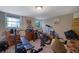 This basement has two windows, carpeted floors, and space for exercise equipment and storage at 3969 Potomac Nw Dr, Kennesaw, GA 30144