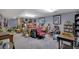 Large basement featuring a full bookcase, carpeted floors, and drop lighting at 3969 Potomac Nw Dr, Kennesaw, GA 30144