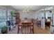 Inviting dining room featuring a large table, chandelier lighting, and natural light at 3969 Potomac Nw Dr, Kennesaw, GA 30144