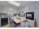Cozy kitchen featuring a small island, updated appliances, and light colored cabinets at 3969 Potomac Nw Dr, Kennesaw, GA 30144