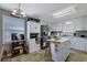 Bright kitchen with white cabinets, an island, appliances, and lots of counter space at 3969 Potomac Nw Dr, Kennesaw, GA 30144