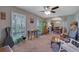 Spacious living room with neutral carpet, bright lighting, and large windows with green outdoor views at 3969 Potomac Nw Dr, Kennesaw, GA 30144