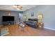 Spacious living room with hardwood floors, ceiling fan, and plenty of seating at 3969 Potomac Nw Dr, Kennesaw, GA 30144