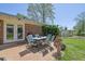 Outdoor patio with table and chairs is perfect for relaxing or entertaining outside on a sunny day at 3969 Potomac Nw Dr, Kennesaw, GA 30144