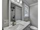 Bathroom with a white sink and quartz countertop at 5155 Rosestone Nw Dr, Lilburn, GA 30047