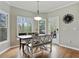 Bright dining area with hardwood floors and lots of natural light at 819 Holly Rdg, Canton, GA 30115