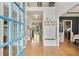 Spacious foyer featuring hardwood floors, high ceilings, and a coat rack with seating at 819 Holly Rdg, Canton, GA 30115