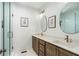 Bright bathroom with double vanity, modern fixtures and glass shower at 4460 Dalston Ne Dr, Atlanta, GA 30342