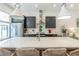 Contemporary kitchen featuring an oversized island with seating, updated appliances, and modern finishes at 4460 Dalston Ne Dr, Atlanta, GA 30342