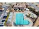 The aerial showcases the community pool with ample seating at 5190 Deerlake Dr, Alpharetta, GA 30005