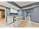 Basement area includes kitchenette with mini fridge and island countertop at 5190 Deerlake Dr, Alpharetta, GA 30005