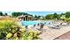 The community pool area provides ample lounge chairs around the sparkling swimming pool at 5190 Deerlake Dr, Alpharetta, GA 30005