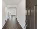 Welcoming entryway featuring wood-look flooring and neutral wall, leading into the main living area at 534 Nolden Trl, Dacula, GA 30019