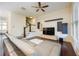 Bright living room with hardwood floors, modern media center, and a comfortable gray leather sectional sofa at 1096 Holly Ave, Atlanta, GA 30338