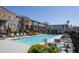 Community pool with ample seating and landscaping surrounding townhome community at 1096 Holly Ave, Atlanta, GA 30338
