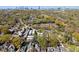 Expansive aerial view of a neighborhood with a cityscape skyline in the distance at 1355 Euclid Ne Ave # 21B, Atlanta, GA 30307