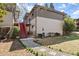 Exterior features a red staircase leading to the upper level, with a manicured lawn and paved walkway at 1355 Euclid Ne Ave # 21B, Atlanta, GA 30307