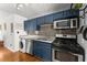 Kitchen with stainless appliances and custom cabinets at 1355 Euclid Ne Ave # 21B, Atlanta, GA 30307