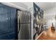 Kitchen shows a stainless steel refrigerator next to custom wood cabinets at 1355 Euclid Ne Ave # 21B, Atlanta, GA 30307