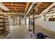 Unfinished basement featuring concrete floor and ceiling with exposed ductwork at 3474 Castleridge Dr, Tucker, GA 30084