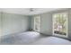 Bedroom with a ceiling fan, carpeted floors, and natural light at 3474 Castleridge Dr, Tucker, GA 30084