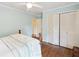 Relaxing bedroom featuring hardwood floors and closet for storage at 3474 Castleridge Dr, Tucker, GA 30084