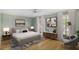 Bedroom virtually staged with hardwood floors, furnishings, and natural light at 3474 Castleridge Dr, Tucker, GA 30084