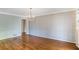 Spacious dining room with wallpaper, hardwood floors, and natural light at 3474 Castleridge Dr, Tucker, GA 30084