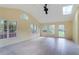 Bright sunroom with vaulted ceilings, skylight, and many windows showcasing the outside greenery at 3474 Castleridge Dr, Tucker, GA 30084