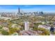Stunning aerial view of the condominium showcasing a vibrant city skyline and lush greenery at 375 Ralph Mcgill Ne Blvd # 502, Atlanta, GA 30312