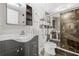 Sleek bathroom featuring modern vanity, toilet, and walk-in shower with tiled walls at 375 Ralph Mcgill Ne Blvd # 502, Atlanta, GA 30312