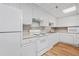 Clean, well-lit kitchen with white cabinets and appliances, offering a practical cooking space at 375 Ralph Mcgill Ne Blvd # 502, Atlanta, GA 30312