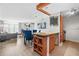 Open-concept living space with a dining area, modern decor, and access to a balcony with ample natural light at 375 Ralph Mcgill Ne Blvd # 502, Atlanta, GA 30312