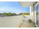 Balcony with seating area and views of the tree tops at 375 Ralph Mcgill Ne Blvd # 502, Atlanta, GA 30312