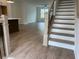 Home interior with staircase, hardwood floors, and modern finishes at 634 Skytop Dr # 155, Cumming, GA 30040