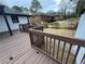 View of a backyard and detached garage of home from the wood deck at 2267 Bryant Dr, East Point, GA 30344