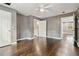 Spacious bedroom with hardwood floors, neutral paint, and a ceiling fan at 2267 Bryant Dr, East Point, GA 30344