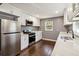 Well-lit kitchen features stainless steel appliances, and new cabinets at 2267 Bryant Dr, East Point, GA 30344