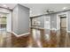 Bright living area with hardwood floors, gray walls, two doorways, and a ceiling fan at 2267 Bryant Dr, East Point, GA 30344