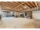 Unfinished basement with exposed ceiling framework, offering room for customization at 3720 River Mansion Dr, Peachtree Corners, GA 30096