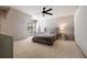 Bedroom features neutral colors and a large window for natural light at 3720 River Mansion Dr, Peachtree Corners, GA 30096